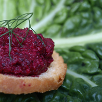 Beetroot based canape served on a cabbage leaf