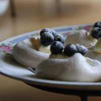 Delicious blueberry pavlovas on a tray